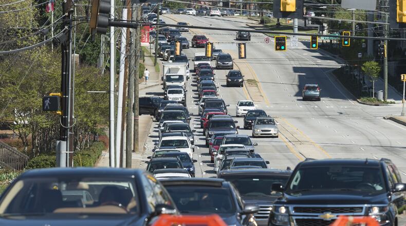 Traffic backs up along southbound Piedmont Road on April 2, 2017. Debris was being cleared after the I-85 fire and bridge collapse on March 30. (DAVID BARNES / DAVID.BARNES@AJC.COM)