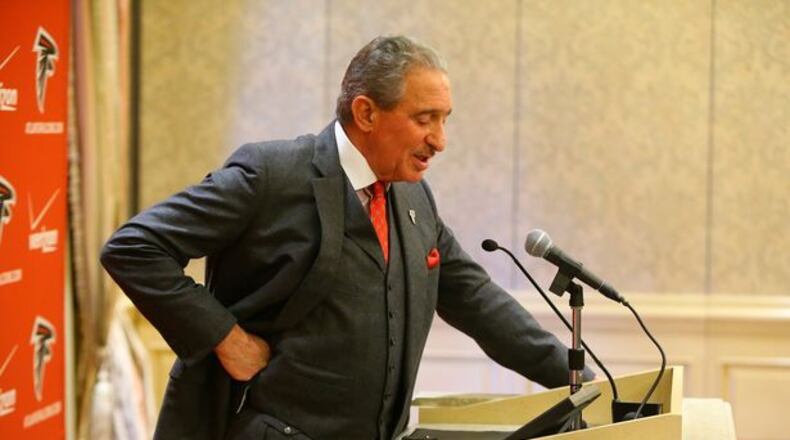 He has a vested interest in filling that new stadium. (Curtis Compton/AJC photo)