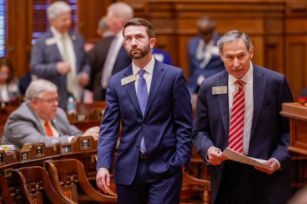 State Reps. Houston Gaines (left), R-Athens, and Mike Cheokas, R-Americus, are pictured at the Capitol in Atlanta on Tuesday. (Arvin Temkar/AJC)
