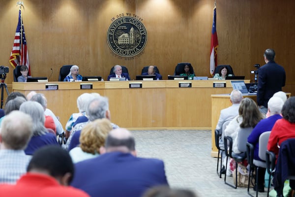The State Election Board listens during a meeting earlier this month at the Fayette County Administration Complex. (Miguel Martinez/AJC)
