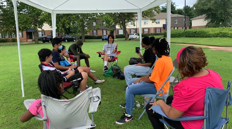 Aric Ting introduced the book "Glimmerings of Hope" with middle schoolers during their recent 3-day mini camp. Ting said, "The book is mainly about the forces at work in society, and I thought it would be fitting as many young people now struggle to make sense of adversity in life and what to do about it. "