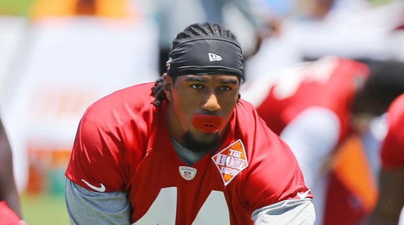 FILE PHOTO: Falcons Vic Beasley Jr. stretches out while the team opens a 3 day mini-camp open to the public on Tuesday, June 16, 2015, in Flowery Branch. Beasley will be counted on to help improve the team's pass rush. Curtis Compton / ccompton@ajc.com