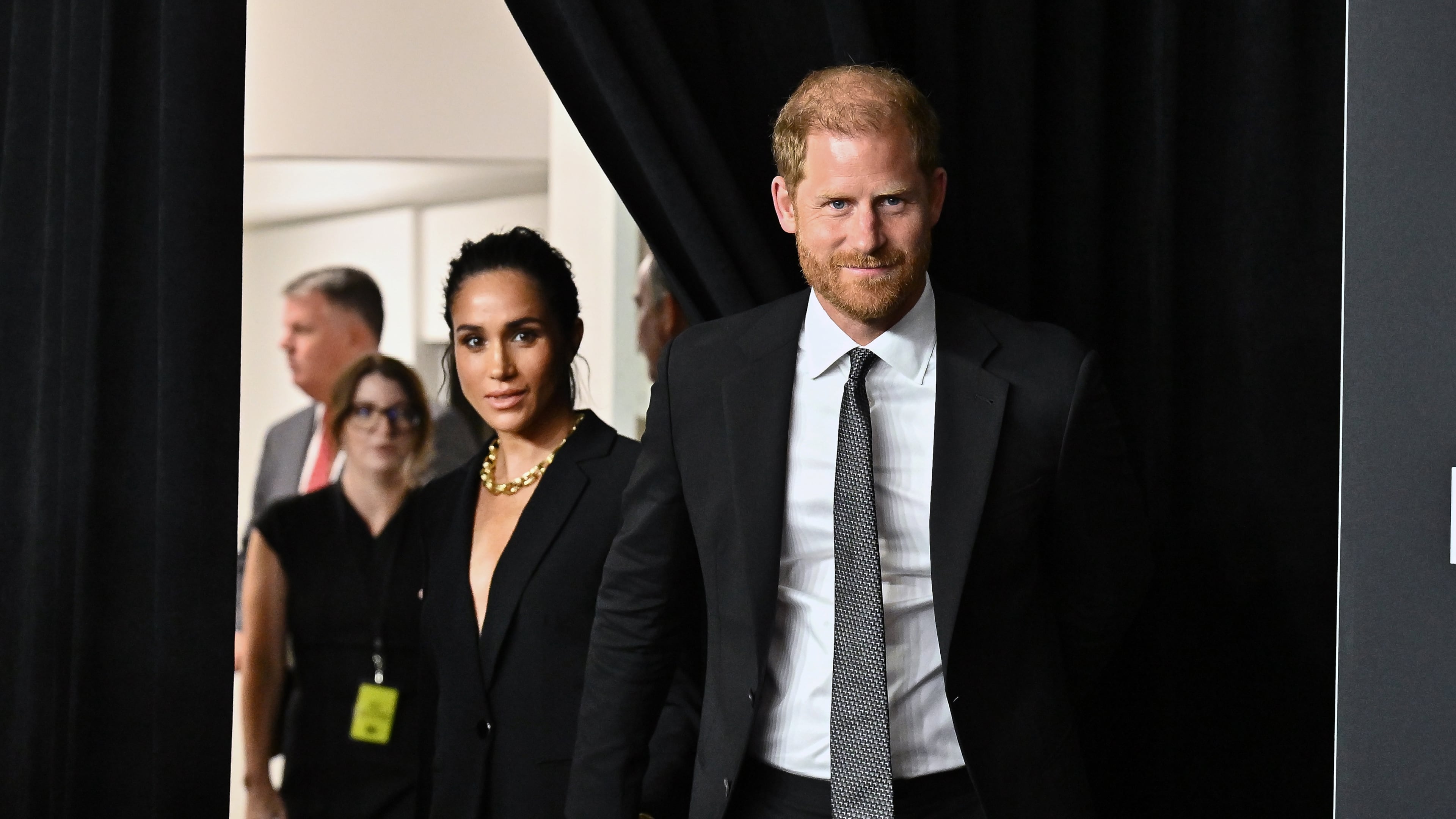 Meghan Markle, left, and Prince Harry, The Duke and Duchess of Sussex, attend the third annual World Mental Health Day Gala, hosted by Project Healthy Minds, at Spring Studios on Thursday, Oct. 9, 2025, in New York. (Photo by Evan Agostini/Invision/AP)