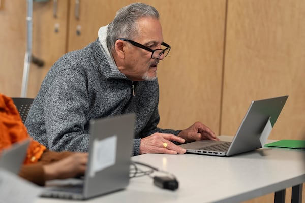 John Castro looks at his computer during a keyboard basics class offered by Free Geek on Thursday, May 15, 2025, in Portland, Ore. (AP Photo/Jenny Kane)