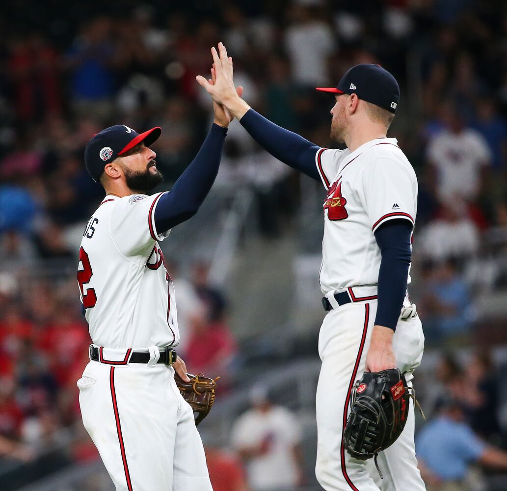 Photos: Braves honor John Schuerholz, beat Marlins