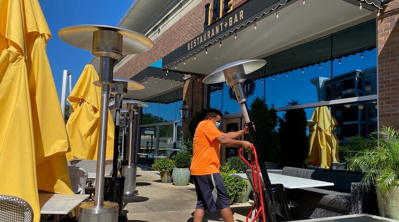 Restaurateur Dave Green purchased $20,000 worth of heaters to winterize the patios at his restaurants, the Select in Sandy Springs and Paces & Vine in Vinings. While other restaurateurs continue to scramble to get their hands on heaters, Green’s shipment of gas heaters arrived Sept. 30. Courtesy of the Select