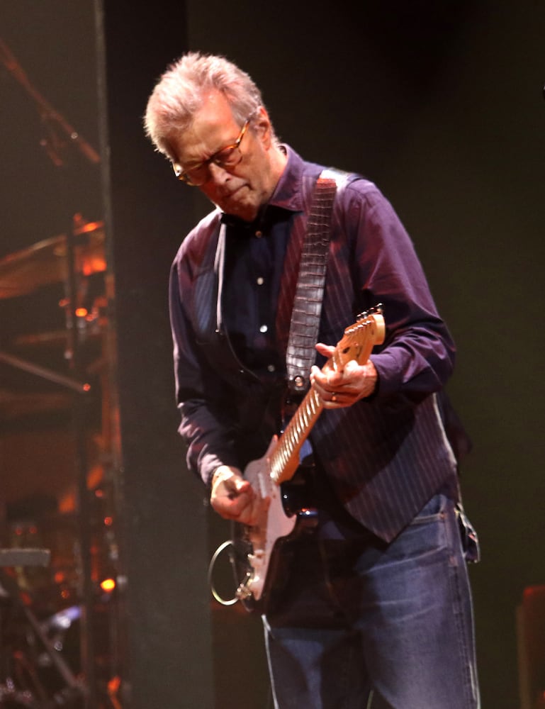 The legendary Eric Clapton rocked the sold out Gas South Arena Thursday, September 23, 2021. His band is a who's who of the best session players in rock: guitarist Doyle Bramhall II, organist Paul Carrack, bassist Nathan East, drummers Sonny Emory and Steve Gadd, keyboardist Chris Stainton, and backup singers Sharon White and Katie Kissoon. Jimmie Vaughan was the opening act.
Robb Cohen for the Atlanta Journal-Constitution