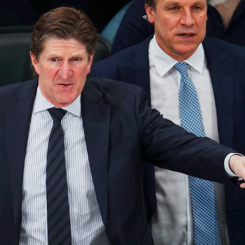 FILE - Toronto Maple Leafs head coach Mike Babcock directs his team against the Colorado Avalanche in the third period of an NHL hockey game, Feb. 12, 2019, in Denver. (AP Photo/David Zalubowski, File)