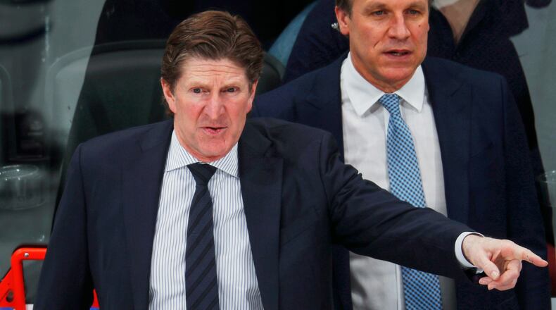FILE - Toronto Maple Leafs head coach Mike Babcock directs his team against the Colorado Avalanche in the third period of an NHL hockey game, Feb. 12, 2019, in Denver. (AP Photo/David Zalubowski, File)