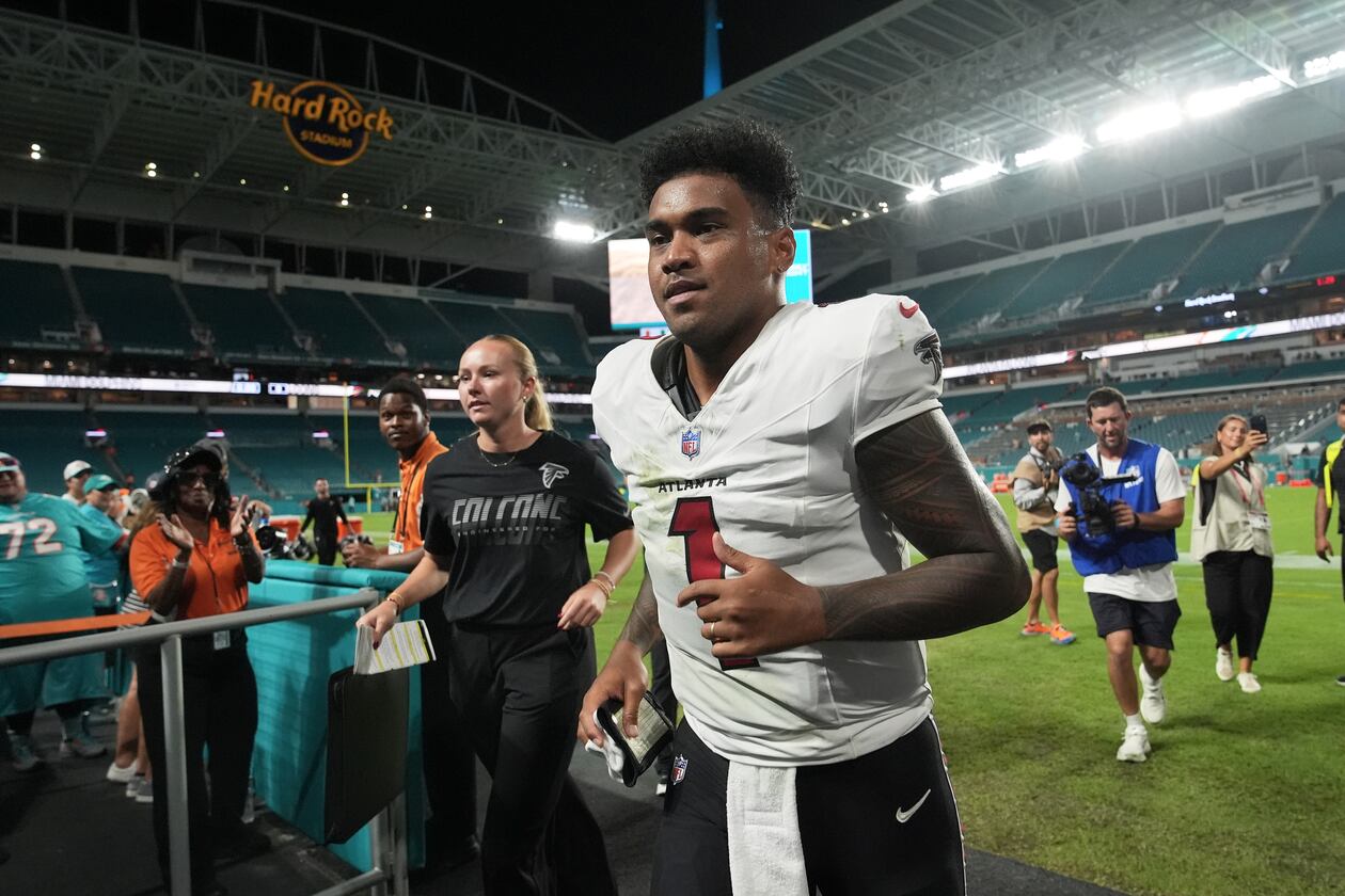 Falcons quarterback Tua Tagovailoa jogs off the field after an NFL exhibition football game against the Dolphins on Friday, Aug. 28, 2026, in Miami Gardens, Fla. Tagovailoa started 76 games for the Dolphins, and will forever hold Miami as the city that changed his life. (Lynne Sladky/AP)