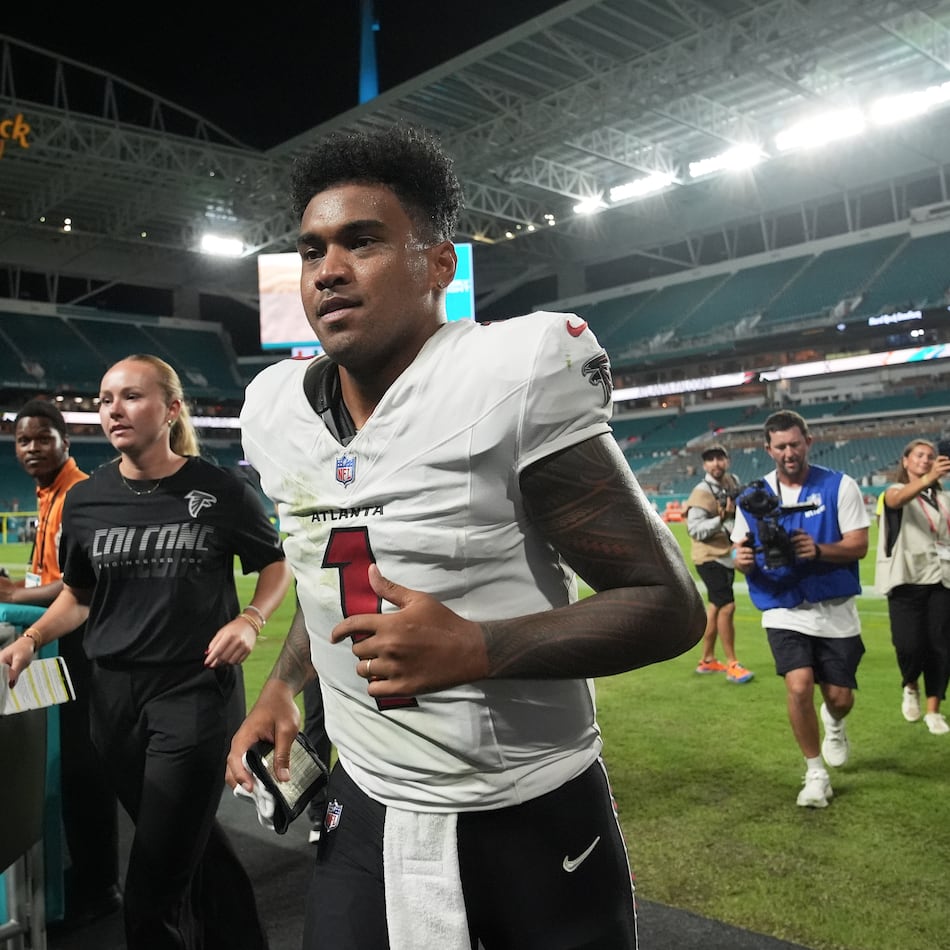Falcons quarterback Tua Tagovailoa jogs off the field after an NFL exhibition football game against the Dolphins on Friday, Aug. 28, 2026, in Miami Gardens, Fla. Tagovailoa started 76 games for the Dolphins, and will forever hold Miami as the city that changed his life. (Lynne Sladky/AP)