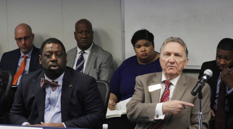 Fulton County Commissioner Lee Morris, right, said he supports a change to the county’s personnel board.