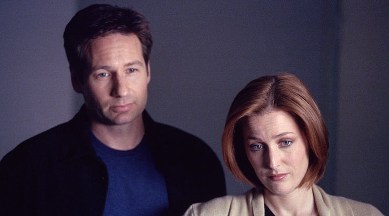 THE X-FILES - SEASON 8: Agents Mulder (David Duchovny, L) and Scully (Gillian Anderson, R) in the "Alone" episode of THE X-FILES which originally aired on Sun., May 6, 2001 (9:00-10:00 PM ET/PT) on FOX. Episode was directed by co executive producer Frank Spotnitz. (Photo by FOX via Getty Images)