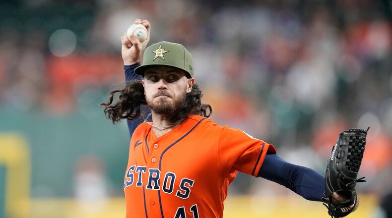 Houston Astros starting pitcher Spencer Arrighetti delivers to Texas Rangers' Joc Pederson during the first inning of a baseball game, Friday, May 15, 2026, in Houston. (AP Photo/Karen Warren)