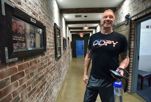 Diamond Dallas Page, a three-time WCW champion, shows off DDP Yoga Performance Center in Smyrna on Aug. 20, 2019. (Hyosub Shin/AJC)