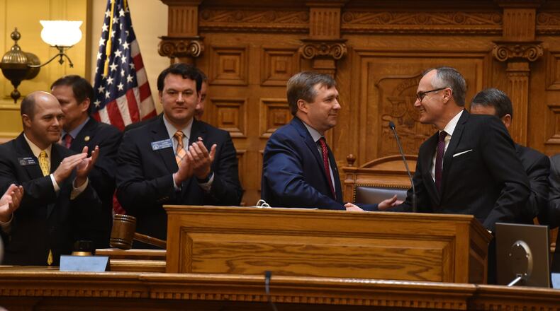Georgia head football coach Kirby Smart is greeted by Lt. Gov. Casey Cagle, right, before briefly speaking in the Georgia Senate In February. Smart also spoke in the House during his visit to the Capitol. Brant Sanderlin / bsanderlin@ajc.com