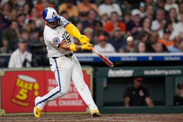 Houston Astros' Isaac Paredes hits a home run against the Cleveland Guardians during the fifth inning of a baseball game Monday, July 7, 2025, in Houston. (AP Photo/David J. Phillip)
