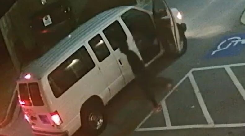 Police are searching for the man, shown in this still image from a surveillance video, who allegedly shot a woman Dec. 14 while she played Pokemon Go in northwest Atlanta.