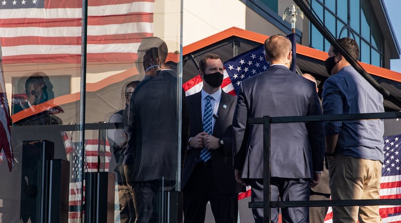 More than 130 Secret Service agents who guard the White House and President Donald Trump when he travels have reportedly been ordered to isolate or quarantine because they tested positive for the coronavirus or had close contact with infected co-workers. These Secret Service agents accompanied Joe Biden in Wilmington, Delaware. (Amr Alfiky/The New York Times)