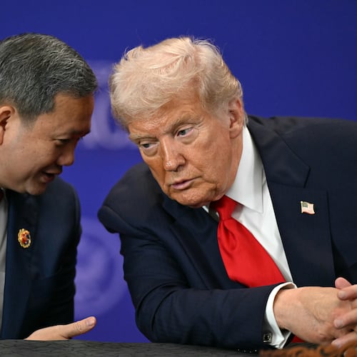 U.S. President Donald Trump listens to Cambodia's Prime Minister Hun Manet, left, ahead of the ceremonial signing of a ceasefire agreement between Thailand and Cambodia on the sidelines of the 47th Association of Southeast Asian Nations (ASEAN) summit in Kuala Lumpur, Malaysia, Sunday, Oct. 26, 2025. (Mohd Rasfan/Pool Photo via AP)