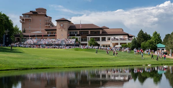 Leaders Mark Hensby, Stewart Cink and Padraig Harrington walk onto the 18th green during the third round of the U.S. Senior Open Championship golf tournament Saturday, June 28, 2025, at the Broadmoor in Colorado Springs, Colo. (Christian Murdock/The Gazette via AP)