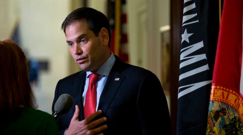 Sen. Marco Rubio, R-Fla., speaks to media outside his office on Capitol Hill in Washington, Wednesday, June 22, 2016. Former Republican presidential candidate Marco Rubio announced Wednesday he will run for re-election to the Senate from Florida, reversing his retirement plans under pressure from GOP leaders determined to hang onto his seat and Senate control. (AP Photo/Carolyn Kaster)