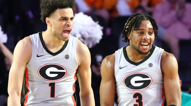 Georgia’s Kario Oquendo (right) and teammate Jabri Abdur-Rahim helped lead the Bulldogs to a season-opening win Monday night. (Curtis Compton file photo / Curtis.Compton@ajc.com)
