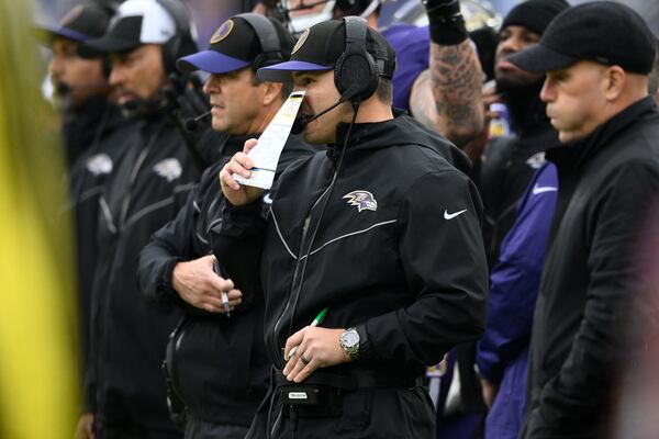 Under then-defensive coordinator Mike Macdonald, the 2023 Ravens defense became the first in NFL history to lead the league in fewest points allowed, sacks and takeaways in the same season. (Nick Wass/AP 2023)