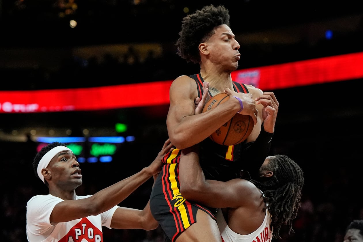 Hawks forward Jalen Johnson, shown here driving against the Toronto Raptors on Friday, Nov. 7, 2025, had a triple-double in Thursday's win over the Utah Jazz. (Mike Stewart/AP)