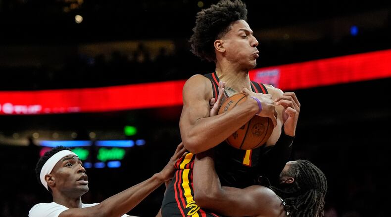 Hawks forward Jalen Johnson, shown here driving against the Toronto Raptors on Friday, Nov. 7, 2025, had a triple-double in Thursday's win over the Utah Jazz. (Mike Stewart/AP)