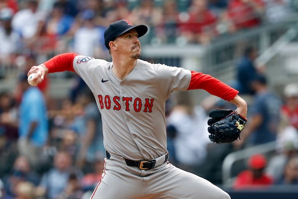 Boston Red Sox's Walker Buehler pitches during the first inning of a baseball game against the Atlanta Braves, Saturday, May 31, 2025, in Atlanta. (AP Photo/Butch Dill)