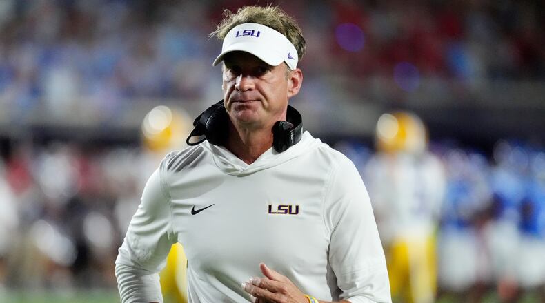 LSU head coach Lane Kiffin gestures towards an official during the first half of an NCAA college football game against Mississippi in Oxford, Miss., Saturday, Sept. 19, 2026. (AP Photo/Rogelio V. Solis)