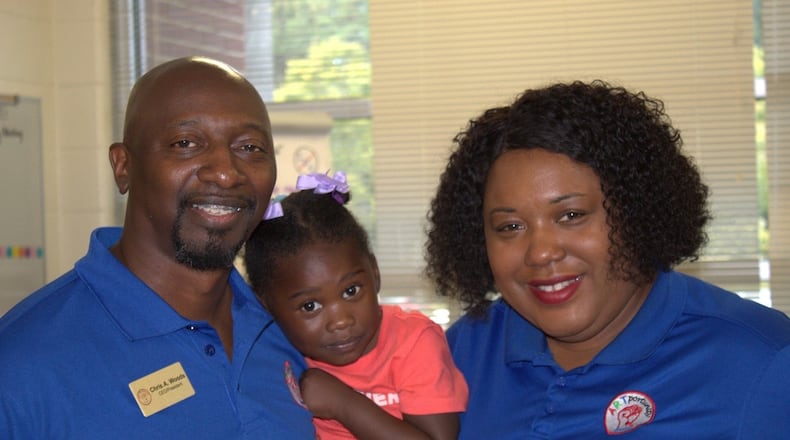 Chris and Ty Woods of ARTportunity Knocks are pictured with daughter Amber. They started the nonprofit to empower students through the arts and encourage community service. They offer in-school and after-school programs. Courtesy of Nichole Maxwell