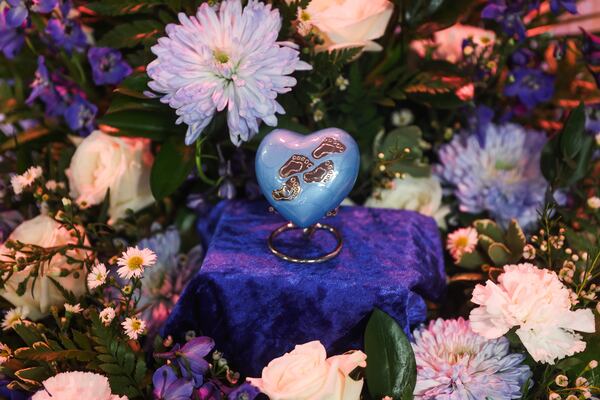 The remains of 1-year-old Daniel Coleman rest in a stone heart before his funeral service at Hollifield Mortuary in Atlanta on Saturday, Aug. 15, 2026. (Abbey Cutrer/AJC)