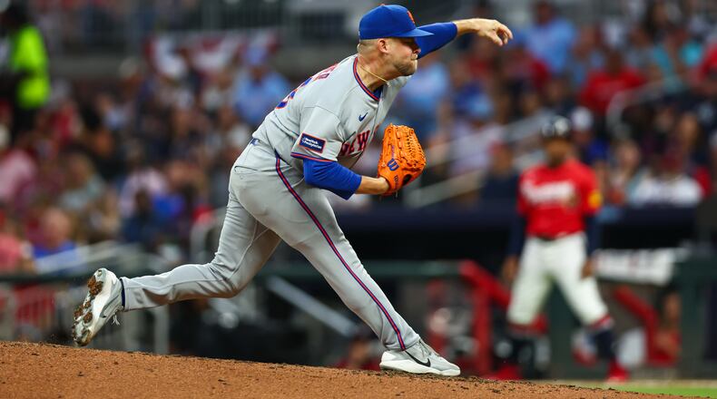 New York Mets pitcher A.J. Minter delivers in the fifth inning of a baseball game against the Atlanta Braves, Friday, July 3, 2026, in Atlanta. (AP Photo/Colin Hubbard)