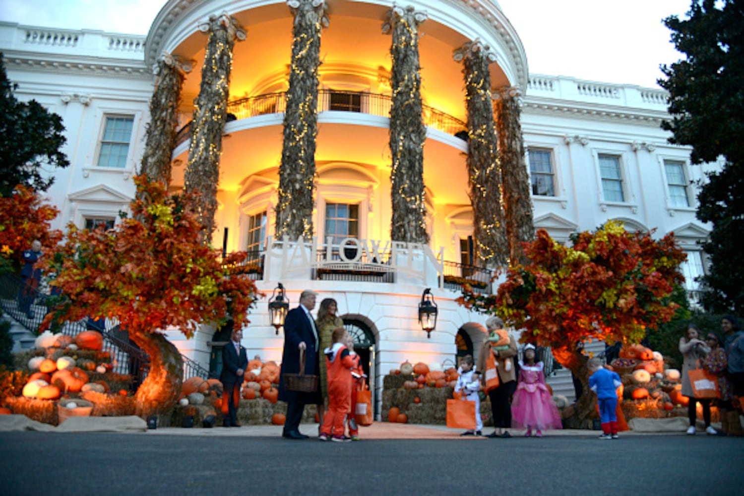 Photos: President Trump, first lady Melania Trump welcome children to White House for Halloween