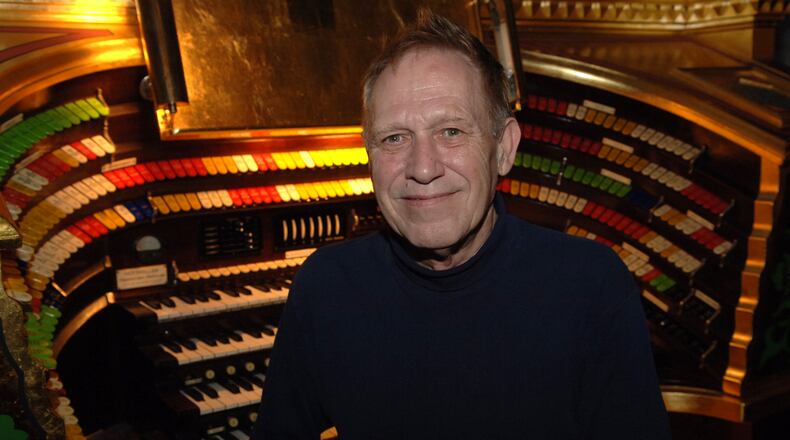 This Dec. 1, 2006 file photo shows Larry-Douglas Embury at the keys of the Fox Theatre’s “Might Mo” organ.”