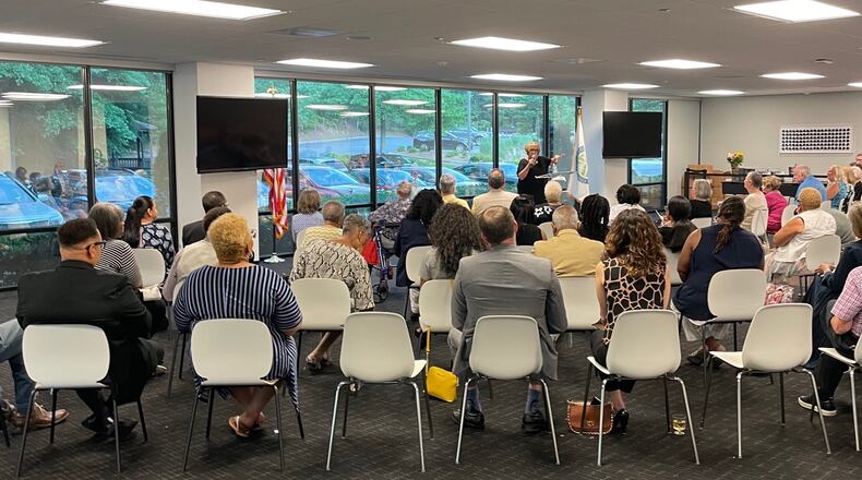 Carole Townsend, author of “Peachtree Corners, Georgia: The History of an Innovative and Remarkable City” thanked the city's mayor, city council and the community behind the research of the book launched May 27. (Photo by Karen Huppertz for the AJC)