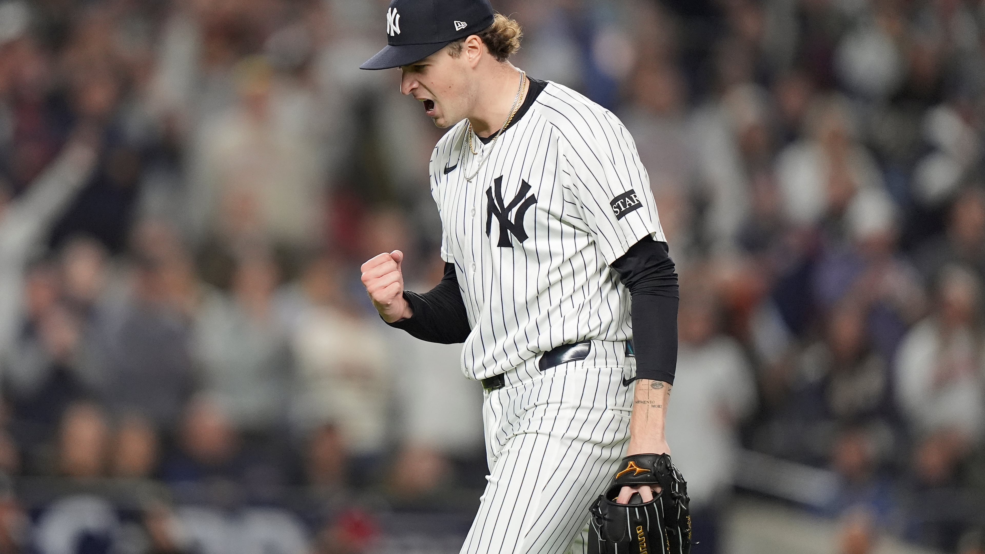 New York Yankees pitcher Cam Schlittler reacts as he walks off the field at the end of the top of the eighth inning of Game 3 of an American League wild-card baseball playoff series against the Boston Red Sox, Thursday, Oct. 2, 2025, in New York. (AP Photo/Frank Franklin II)