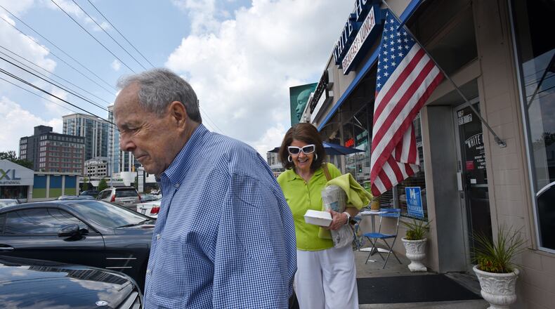 Former Atlanta Mayor Sam Massell and his wife Sandra Gordy leave White House Restaurant in Buckhead on Sunday, July 23, 2017.