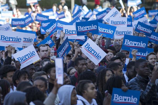 Supporters hold signs for Sen. Bernie Sanders during his New Deal Democrats Rally for Sen. Bernie Sanders at Morehouse College in Atlanta, Thursday, November 21, 2019. ALYSSA POINTER/AJC