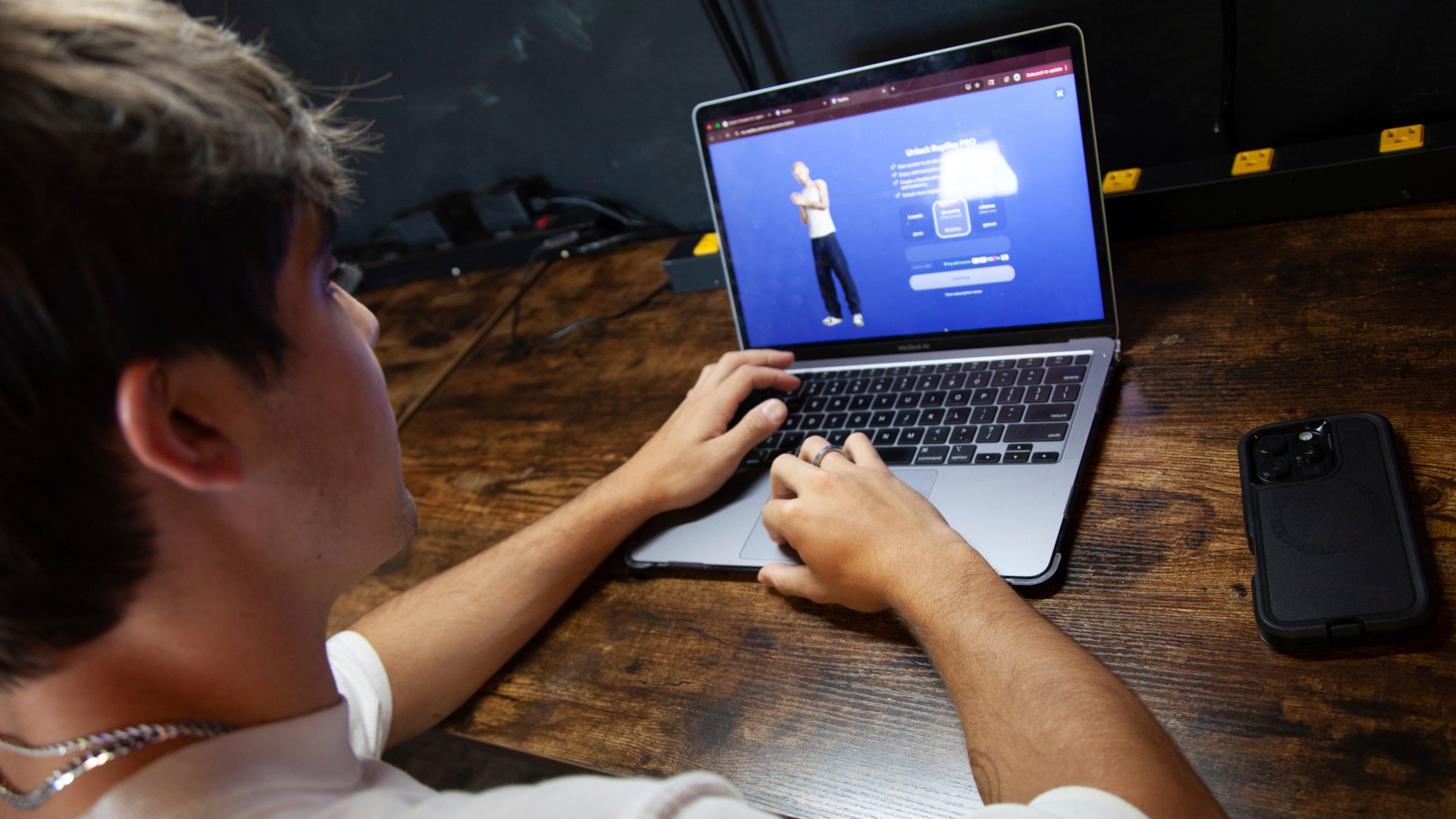Bruce Perry, 17, demonstrates the possibilities of artificial intelligence by creating an AI companion on Character.AI,, July 15, 2025, in Russellville, Ark. (AP Photo/Katie Adkins, file)