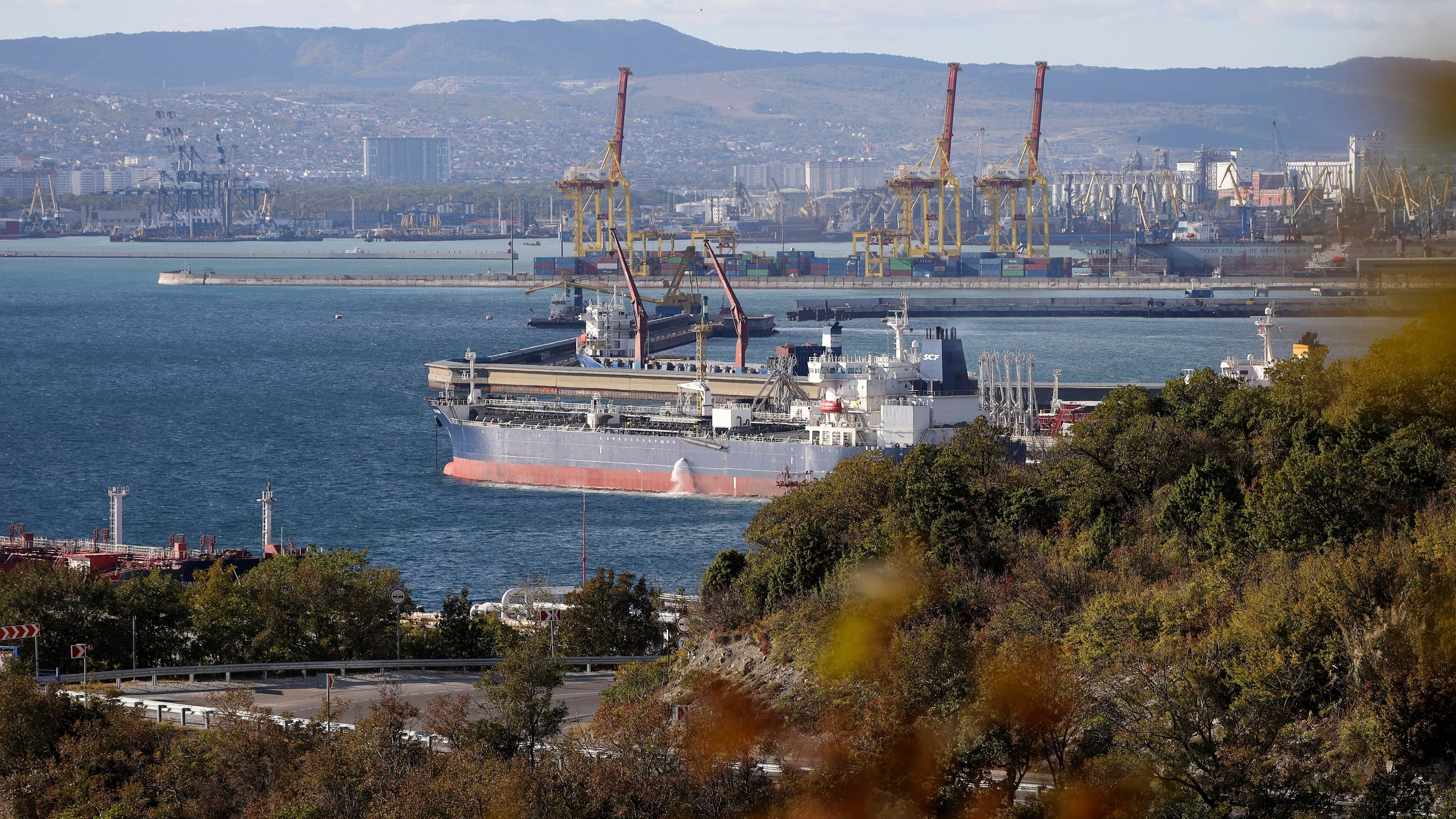 FILE - An oil tanker is moored at the Sheskharis oil and petroleum complex on the Black Sea port of Novorossiysk, Russia, Oct. 11, 2022. (AP Photo, File)
