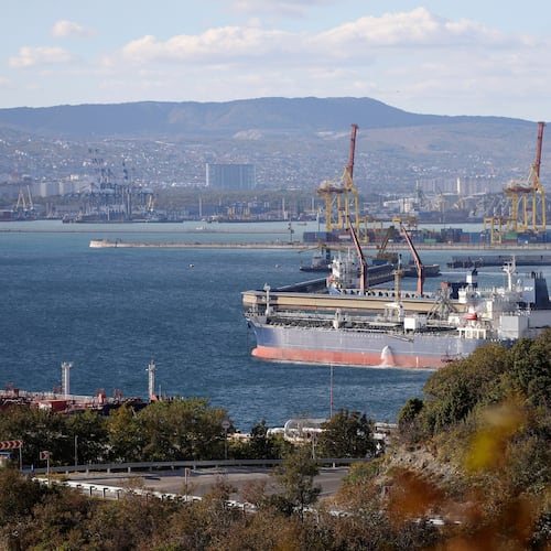 FILE - An oil tanker is moored at the Sheskharis oil and petroleum complex on the Black Sea port of Novorossiysk, Russia, Oct. 11, 2022. (AP Photo, File)