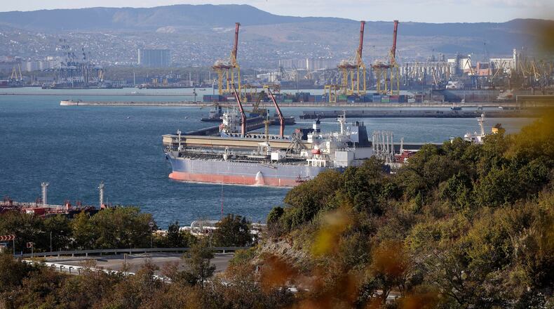 FILE - An oil tanker is moored at the Sheskharis oil and petroleum complex on the Black Sea port of Novorossiysk, Russia, Oct. 11, 2022. (AP Photo, File)