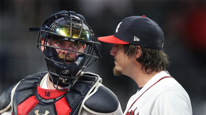 August 13, 2019 Atlanta: Atlanta Braves catcher Brian McCann confers with pitcher Luke Jackson during the seventh inning against the New York Mets in a MLB baseball game on Tuesday, August 13, 2019, in Atlanta.   Curtis Compton/ccompton@ajc.com