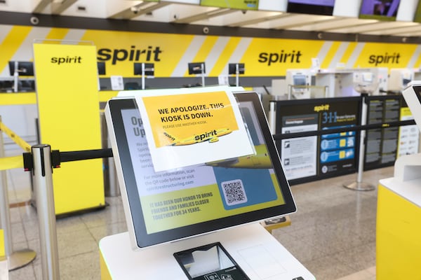 The Spirit Airlines departure check-in area is shown vacant at the Domestic Terminal North at Hartsfield-Jackson Atlanta International Airport, Tuesday, May 5, 2026, in Atlanta. Spirit Airlines ceased all operations and announced on Saturday, May 2nd, that it has gone out of business after 34 years. (Jason Getz/AJC)