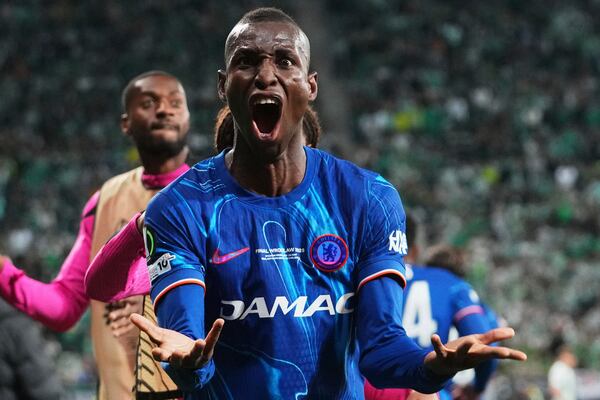Chelsea's Nicolas Jackson celebrates after scoring during the Europa League final soccer match between Real Betis and Chelsea in Wroclaw, Poland, Wednesday, May 28, 2025. (AP Photo/Petr David Josek)