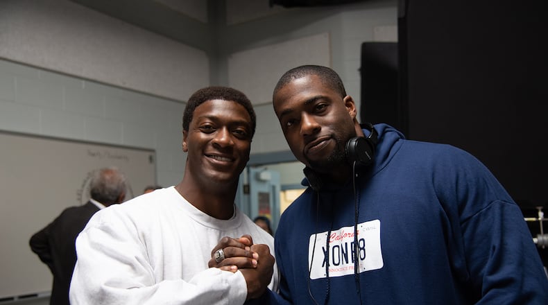 Actor Aldis Hodge (left) and the real life Brian Banks (right) on the set of BRIAN BANKS, a Bleecker Street release. Credit: Katherine Bomboy / Bleecker Street