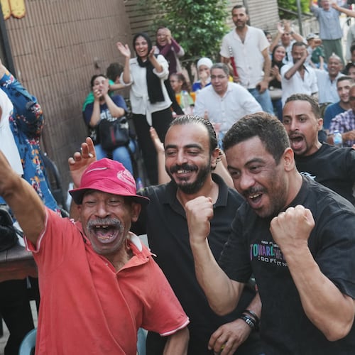 Fans celebrate Egypt's goal on Argentina during a watch party for the World Cup knockout stage, in Cairo, Egypt, Tuesday, July 7, 2026. (AP Photo/Amr Nabil)